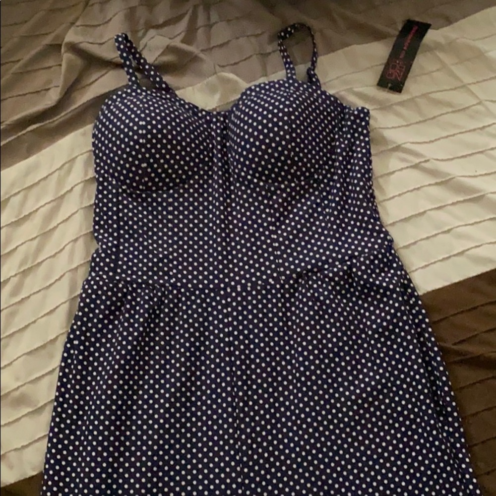 Blue and white polka dot romper